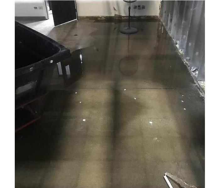 Concrete floor with standing water