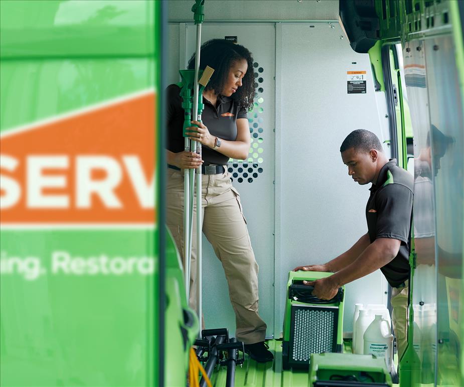 Image of SERVPRO employees preparing for a job